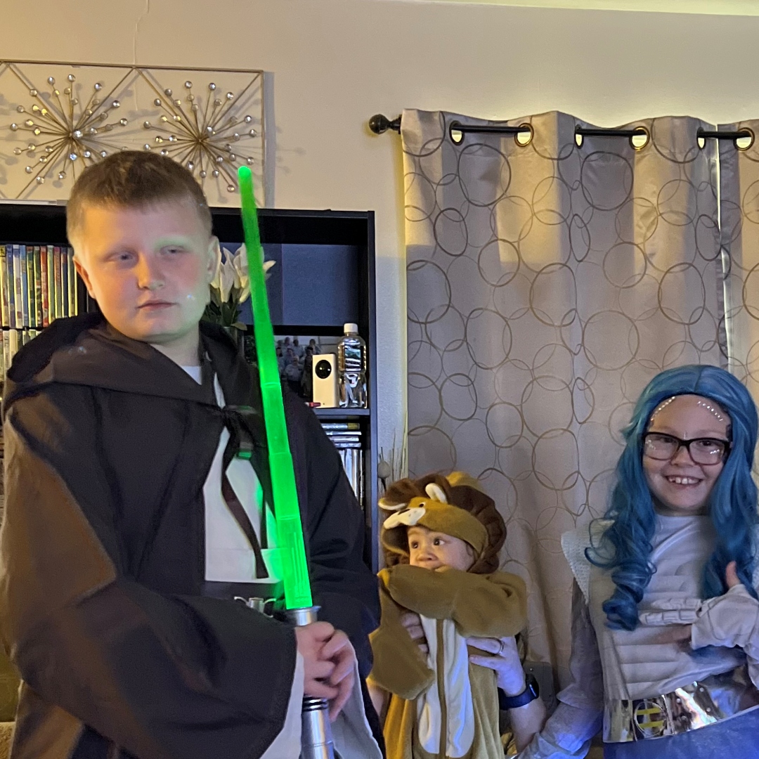 Kids dressed up in Star Wars and Halloween costumes.